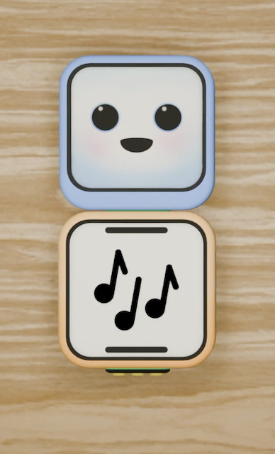 Pezzi music in pieces game artwork on a wooden background.